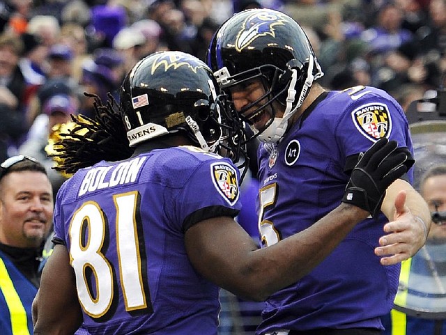 Baltimore Ravens wide receiver Anquan Boldin (81) celebrates his touchdown catch with quarterback Joe Flacco (5) during the fourth quarter of Sunday’s wild-card playoff game against the Indianapolis Colts in Baltimore. Boldin had five catches for 145 yards. 