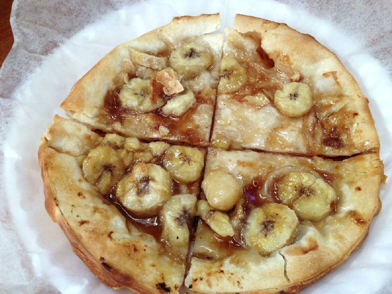Jay's Pizza in the Little Rock River Market serves savory pies as well as a few sweet dessert pizzas, such as banana with rum sauce.