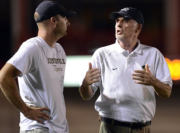 Barry Lunney Jr. (left) has spent the last eight seasons coaching for his father Barry Lunney Sr. (right) at Bentonville High School. 