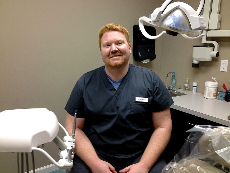 Dr. Matt Bridwell of Sheridan Family Dentistry offers free emergency dental care one day every other month at his office. Patients start lining up early in the morning before the office opens. The dentist sees as many patients as he can in four hours, usually around 25. 