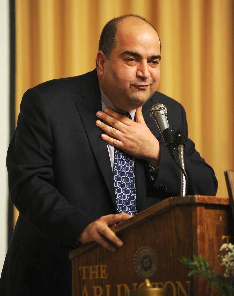 Noted impersonator Frank Mirahmadi, entering his second season as Oaklawn Park’s track announcer, does his best Rodney Dangerfield during a recent speaking engagement. 