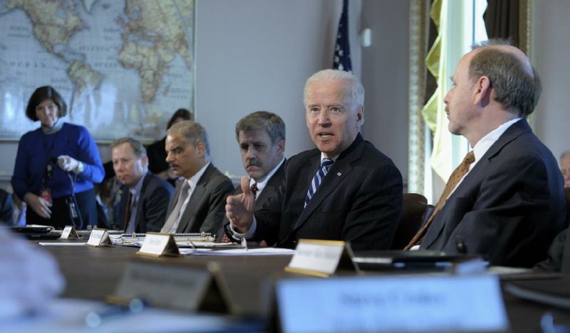 Vice President Joe Biden (second from right) said Thursday that he’s seeing “an emerging set of recommendations” on gun policies. 