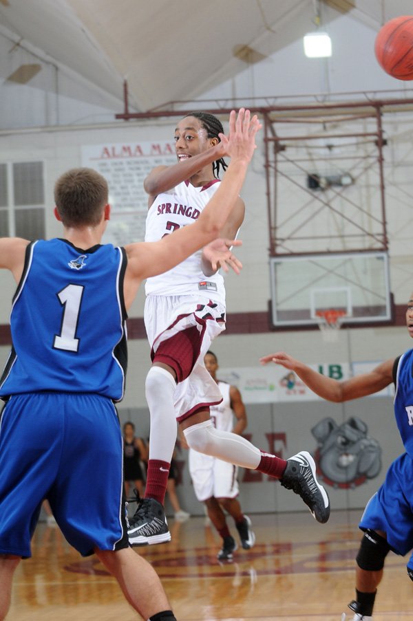 DaShaun Stark, center, of Springdale has become a vocal leader for the Bulldogs. 