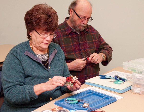 Thom and Ann Johnston are among the students who have learned to make jewelry in Katy Lamm-Rogers’ class at the NWACC Bella Vista Center. 