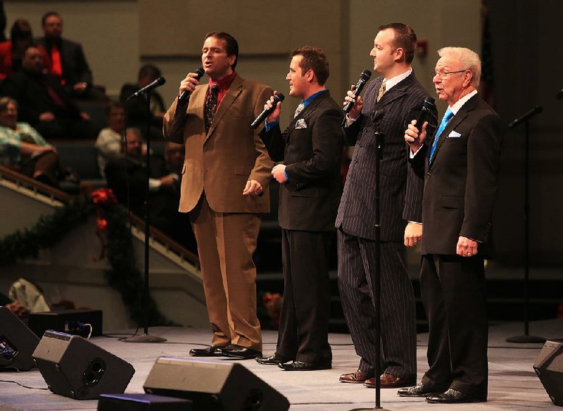 Gerald Williams (far right), bass singer with The Melody Boys Quartet for the past 63 years, performs a farewell concert at Geyer Springs First Baptist Church in Little Rock on New Year’s Eve in a concert featuring current and former members of the quartet, including (from left) Tim Williams, Chris Walton and Caleb Matheny. The group disbanded after the concert. 