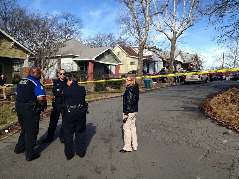 Police investigate Friday, Jan. 11, 2013, a shooting near 14th and Brown streets in Little Rock.