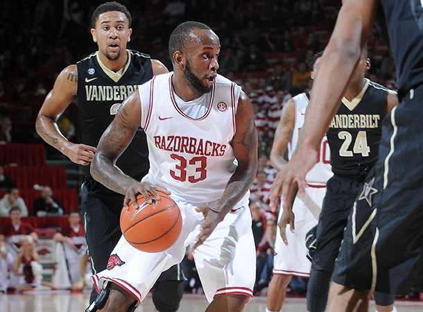 NWA MEDIA/SAMANTHA BAKER -- Arkansas' Marshawn Powell drives into Vanderbilt's defense Saturday, Jan. 12, 2013, during the first half of a game at Bud Walton Arena in Fayetteville.