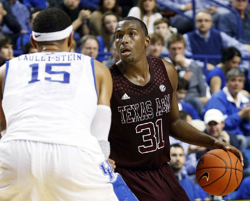 Texas A&M’s Elston Turner (31) scored 40 points to lead the Aggies as they defeated Kentucky 83-71 on Saturday at Rupp Arena in Lexington, Ky. 