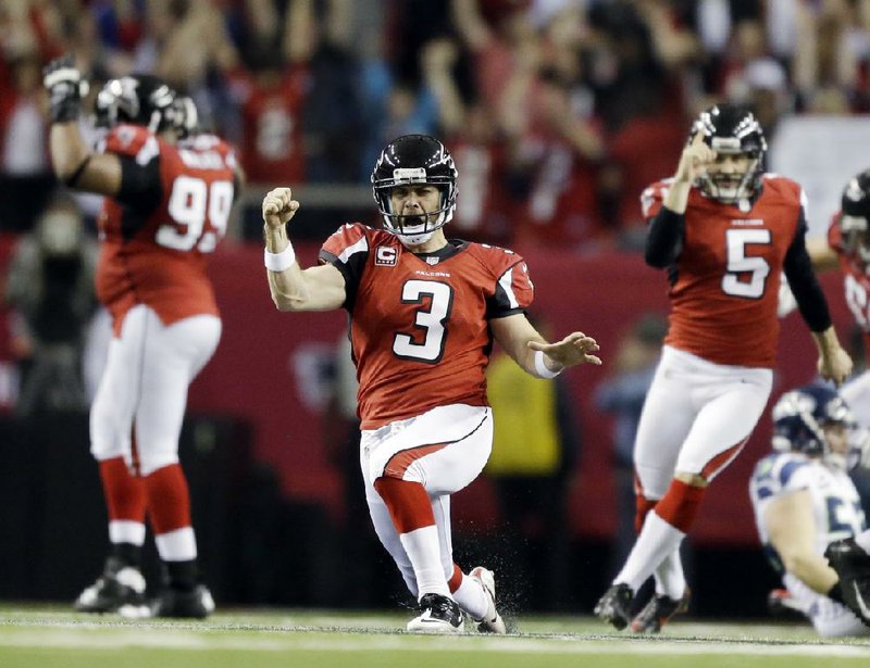 Atlanta Falcons kicker Matt Bryant (3) celebrates after kicking the game-winning field goal Sunday against the Seattle Seahawks in Atlanta. The Falcons squandered a 20-point lead in the fourth quarter, then mounted a comeback to win 30-28. 