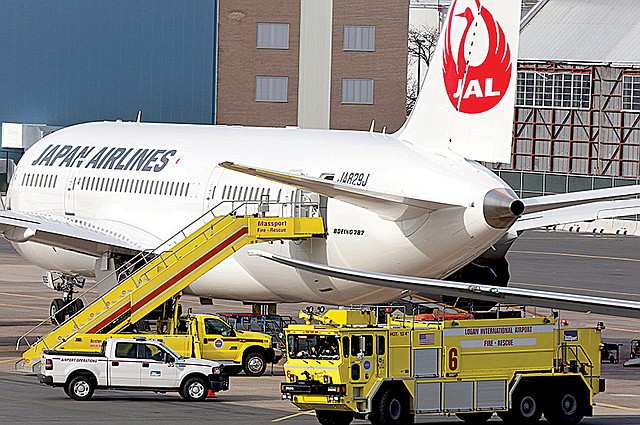 Special-operations vehicles surround a Boeing Co. 787 Dreamliner jet parked at a gate at Logan International Airport in Boston last week after a fire aboard the passenger jet caused “severe damage” to a battery unit. 