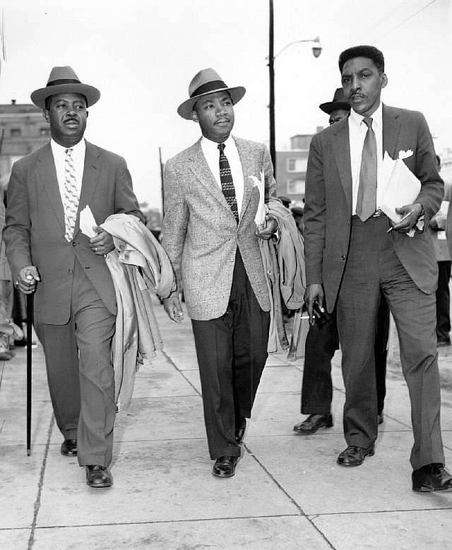 Martin Luther King Jr. (center) and Bayard Rustin, right, in 1956, when they were leading the bus boycott in Montgomery, Alabama. They are shown with the Rev. Ralph Abernathy (left).