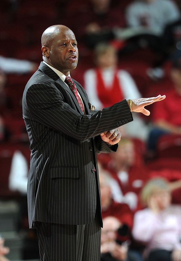 Arkansas coach Mike Anderson directs players Saturday during the second half against Vanderbilt at Bud Walton Arena in Fayetteville. 