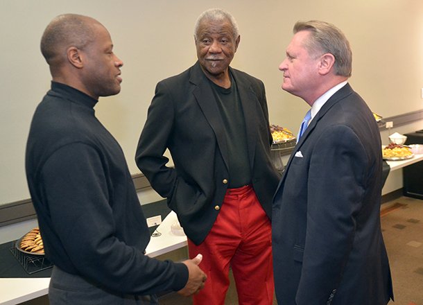 Mike Anderson (left), Nolan Richardson (center) and University of Arkansas chancellor David Gearhart speak during a 2011 event in Fayetteville. 