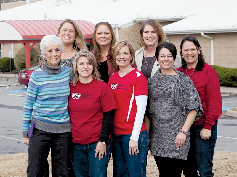 Pictured are Women Run Clinic State Board members, front row, from the left, Linda Starr, Women Run Arkansas ambassador; Karen Buckner, secretary; Jackie Stone, membership; Tambra Clement, state clinic director; and Nichole Bates, president; and back row, from the left, Jennifer Welter, race director; Jennifer Marks, treasurer; and Jane Hambuchen, pasta-party chairwoman.
