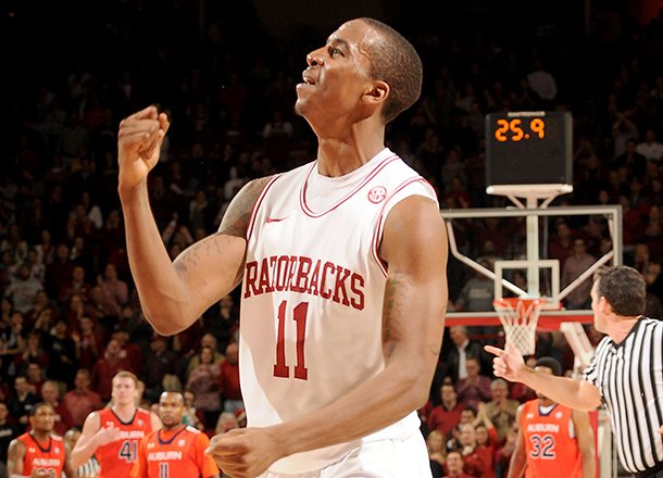 NWA Media/ANTHONY REYES -- Arkansas sophomore BJ Young celebrates in the second half against Auburn on Wednesday, Jan. 16, 2013 in Bud Walton Arena in Fayetteville. The Razorbacks won 88-80 in double overtime.