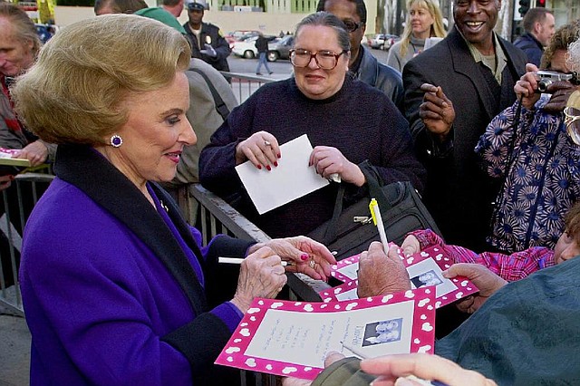 Dear Abby advice columnist Pauline Friedman Phillips signs autographs in 2001 after the dedication of a Dear Abby star on the Hollywood Walk of Fame. She died Wednesday. 