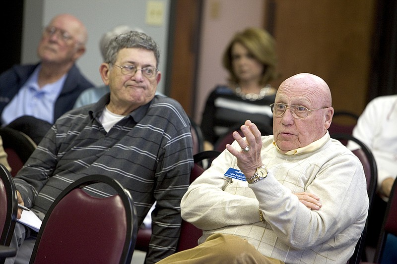 Tom Arwood, right, talks about his ideas for the economic development of Saline County. Arwood and Mike Medica, left, were among attendees at a public meeting held Wednesday by Del Boyette, president & CEO of Boyette Strategic Advisors, to gather public opinions about the county.