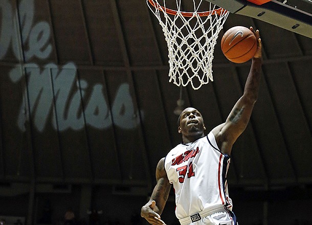 Mississippi's Murphy Holloway (31) dunks the ball in a game against Arkansas at Tad Smith Coliseum in Oxford, Miss., on Saturday, Jan. 19, 2013. (AP Photo/Oxford Eagle, Bruce Newman)