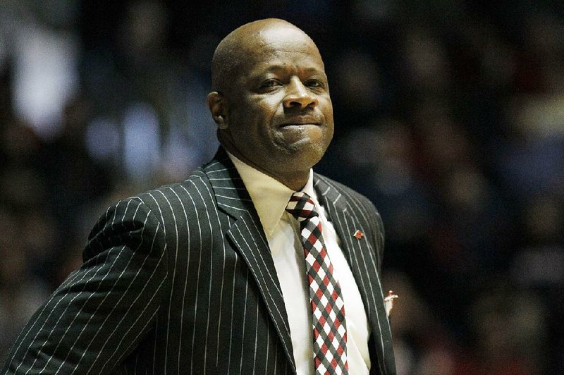 Arkansas coach Mike Anderson shows frustration during the second half of an NCAA college basketball game against Mississipppi, Saturday, Jan. 19, 2013, in Oxford, Miss. Mississippi won 76-64. (AP Photo/Rogelio V. Solis)