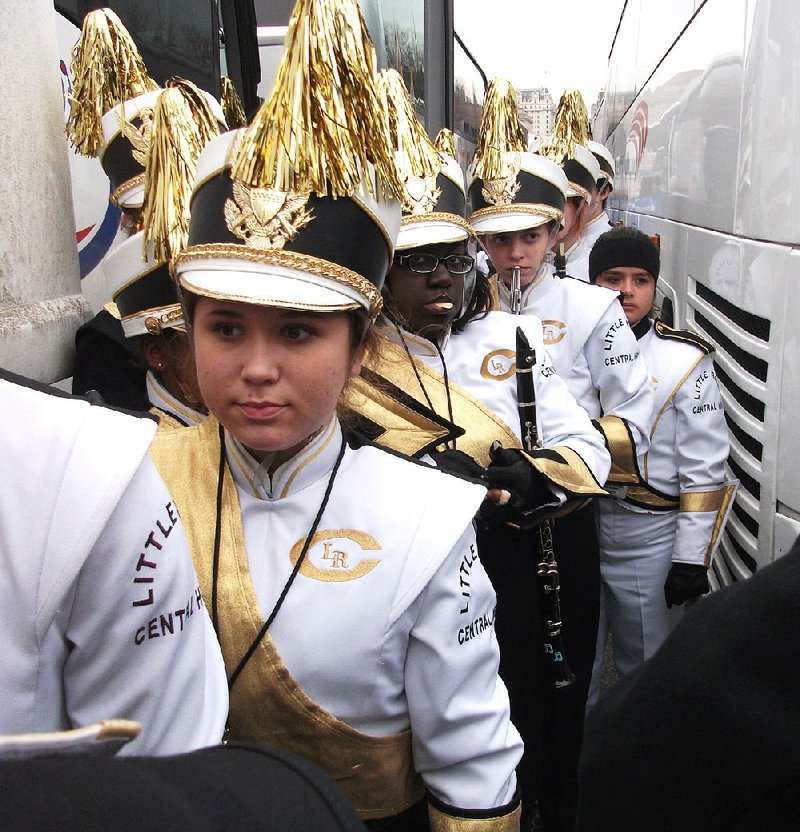 The Little Rock Central High School marching band members (from left) Samantha Buxbaum, Ashley Louden, Kathryn Bryles and Maryssa Barron lined up Monday, hours before joining the inaugural parade in Washington. 