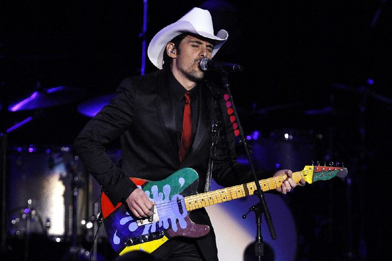 Brad Paisley performs at the Commander-in-Chief's Inaugural Ball in Washington, at the Washington Convention Center during the 57th Presidential Inauguration Monday, Jan. 21, 2013. (AP Photo/Jacquelyn Martin)