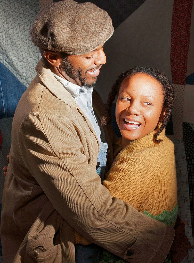 Corey Jones (left), as Macon, and Nambi E. Kelley, as Sadie, star in the Arkansas Repertory Theatre’s production of Gee’s Bend. 