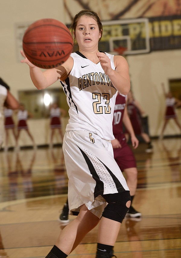       
Bentonville’s Kindal Coleman grabs an inbound pass Tuesday during the Lady Tigers’ game against Springdale at Tiger Arena in Bentonville. 