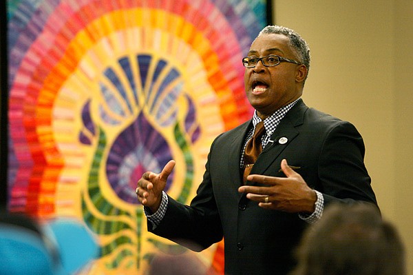 John L. Benford speaks Thursday during NorthWest Arkansas Community College’s annual Martin Luther King Jr. program at the school’s student center in Bentonville. 