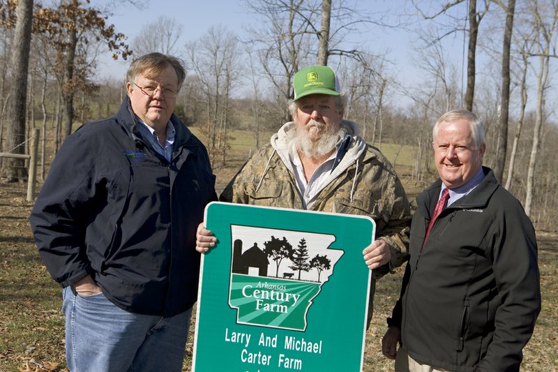 Ricky, from left, Larry and Ronny Carter own the Larry and Michael Carter Farm, which has been owned by the same family for more than 160 years.