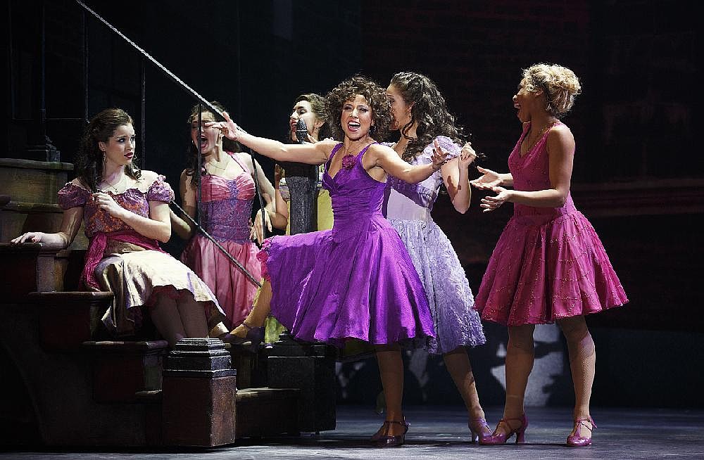anita's purple dress west side story One Iconic Look: Rita Moreno's Lavender Dress in West Side Story (1961)