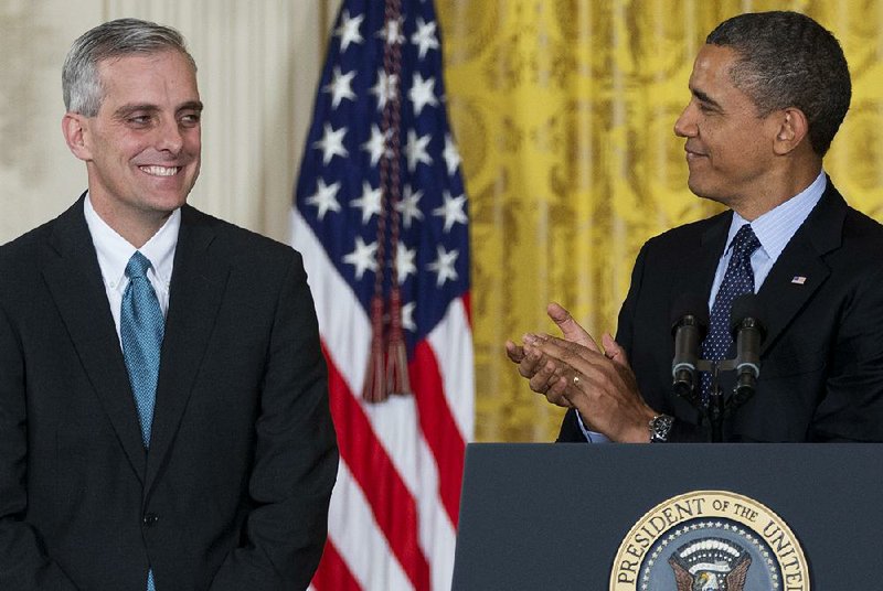 President Barack Obama announces Friday in the East Room of the White House that he is naming Denis McDonough (left), now deputy national security adviser, his next chief of staff. 