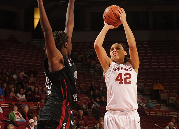 NWA Media/ANDY SHUPE -- Arkansas sophomore forward Jhasmin Bowen (42) South Carolina sophomore forward Aleighsa Welch during the second half Sunday, Jan. 27, 2013, in Bud Walton Arena.