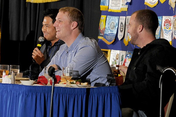 Bruce Chen, Will Smith and Danny Duffy, from left, Kansas City Royals players, laugh along with a story Chen is telling Monday during the 2013 Royals Caravan in Springdale. (Below left) Dennis Leonard, left, former Kansas City Royal, tells a story as Royals broadcaster Steve Physioc looks on. (Below center) Amber Walter of Rogers gets her shirt signed by Kansas City Royal Danny Duffy. (Below right) Lucas McDaniel, 10, of Springdale tries to keep Kansas City Royals mascot Sluggerrr out of his ice cream as Emily McDaniel, 9, looks on. 