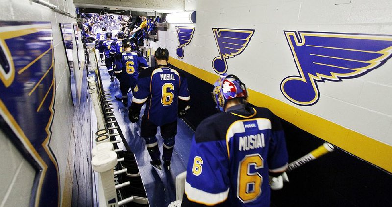 The St. Louis Blues wore jerseys honoring former St. Louis Cardinals great Stan Musial during pregame warmups Sunday. Musial died Jan. 19 at 92. 