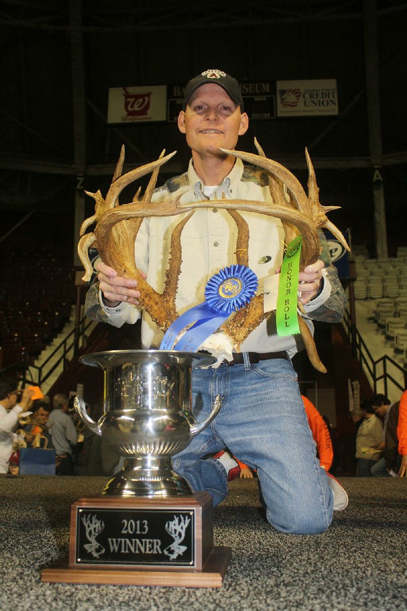 Mike Miller of Marion won the Arkansas Big Buck Classic with a rack that netted 215 6/8 Boone and Crockett. Miller killed the buck with a crossbow that he used for the first time. 