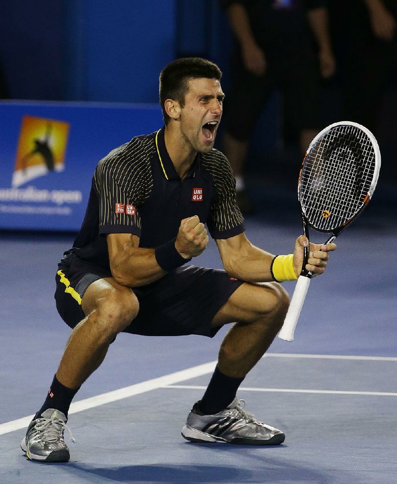 Novak Djokovic reacts after beating Andy Murray in the men’s final of the Australian Open on Sunday. It was his sixth Grand Slam title. 