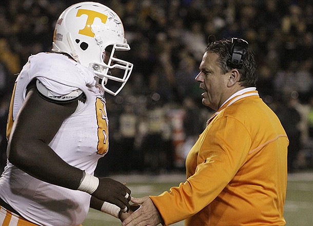 Arkansas offensive line coach Sam Pittman, who coached at Tennessee in 2012, was pivotal in Dan Skipper's decision to switch verbal commitments from the Volunteers to the Razorbacks. (Chattanooga Times/Patrick Smith)