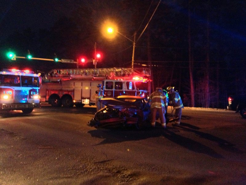 A car-pickup collision clogs traffic early Tuesday, Jan. 29, 2013, at Cantrell and Reservoir roads in west Little Rock.