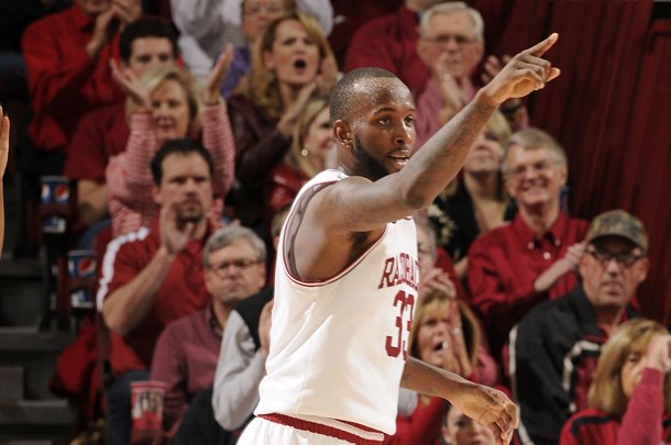 Arkansas junior forward Marshawn Powell (33) motions to his teammates against Oklahoma in the second half Tuesday, Dec. 4, 2012 at Bud Walton Arena in Fayetteville. The Razorbacks won 81-78.