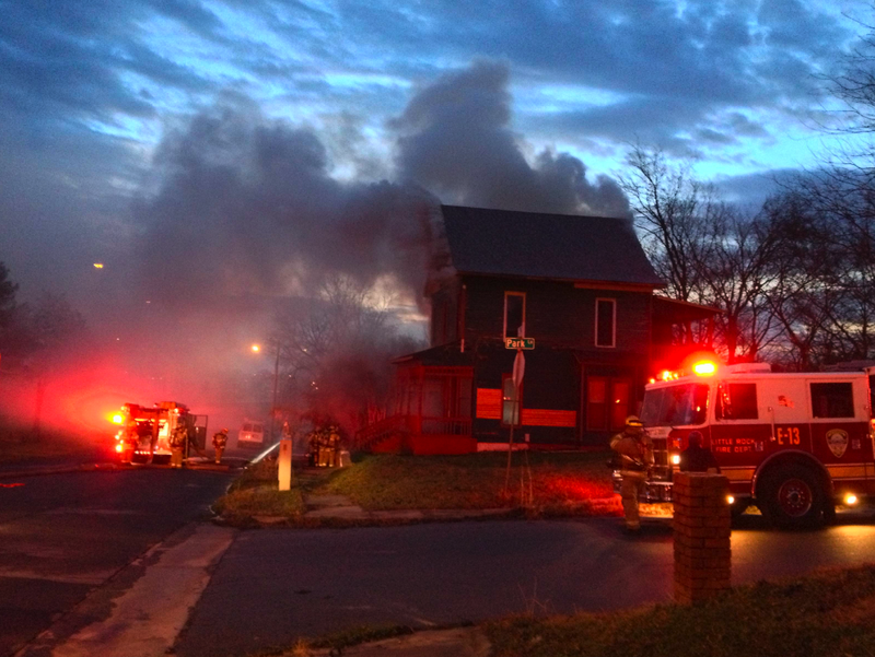 Crews work a fire at East 15th Street and Park Lane in Little Rock Wednesday morning.
