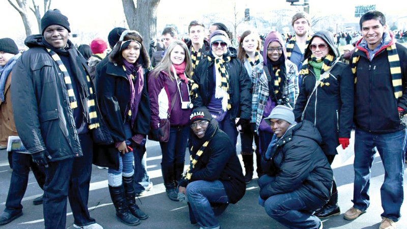 University of Central Arkansas students pose for a photo outside the U.S. Capitol during Barack Obama’s second inauguration on Jan. 21. Kneeling, from the left, are William Edwards and Elyahb Allie Kwizera; and standing, from the left, Arzalious Davis, Kailen Hardman, Jade Edwards, Jared LaReau, Allison Rubio, Paige Murphy, Darlecia Williams, Adam Price, Kristin Weatherford and Chris Melendez. 