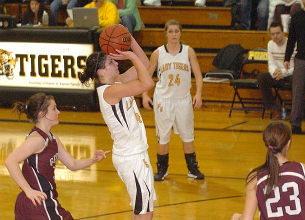 Prairie Grove junior Lacey Beeks pulls up to take a jumper against Gentry. Beeks scored 19 points as the Lady Tigers defeated Gentry, 62-27, on Friday.
