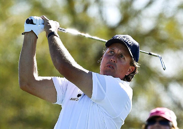 PGA Tour golfer Phil Mickelson missed a chance to break the PGA Tour’s 36-hole scoring record Friday when he finished with a double bogey during the second round of the Phoenix Open in Scottsdale, Ariz. 