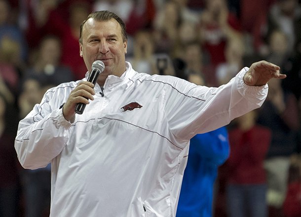 Arkansas head football coach Bret Bielema speaks during a time out in the first half of a NCAA college basketball game against Tennessee in Fayetteville, Ark., Saturday, Feb. 2, 2013. Arkansas defeated Tennessee 73-60. (AP Photo/Gareth Patterson)