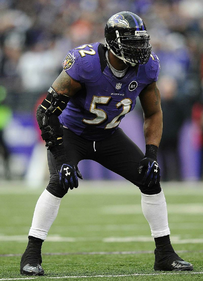 In this Jan. 6, 2013, file phot, Baltimore Ravens inside linebacker Ray Lewis (52) works against the Indianapolis Colts during the second half of an NFL wild card playoff football game in Baltimore. Lewis will retire after the Ravens play the San Francisco 49ers in Super Bowl XLVII on Sunday in New Orleans. (AP Photo/Nick Wass, File)
