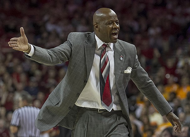 Arkansas' head coach Mike Anderson disputes a call during the second half an NCAA college basketball game against Tennessee in Fayetteville, Ark., Saturday, Feb. 2, 2013. Arkansas defeated Tennessee 73-60. (AP Photo/Gareth Patterson)