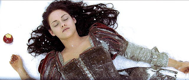Kristen Stewart bites the apple — and the dust — as Snow White in Snow White and the Huntsman, one of many recent and to-come fairy tale movies. 