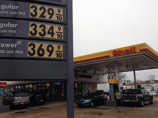 Regular unleaded gas was selling for just under $3.30 a gallon Monday morning, Feb. 4, 2013, at the Shell station on Broadway Street in downtown Little Rock, 