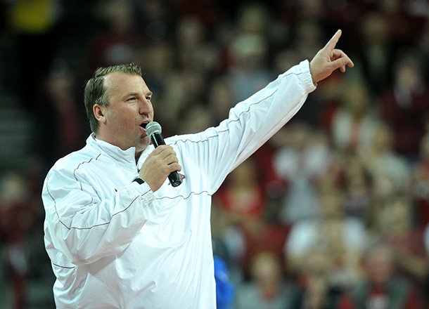 NWA Media/MICHAEL WOODS --02/02/2013-- University of Arkansas football coach Bret Bielema addresses the Razorbacks basketball fans during a time out in the first half of Saturday afternoon's game against the Tennessee Volunteers at Bud Walton Arena in Fayetteville.