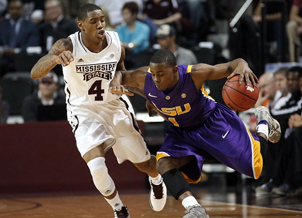 LSU guard Anthony Hickey (1) pushes past Mississippi State guard Trivante Bloodman (4) during the second half of an NCAA college basketball game in Starkville, Miss., Saturday, Feb. 2, 2013. LSU won 69-68. (AP Photo/Rogelio V. Solis)